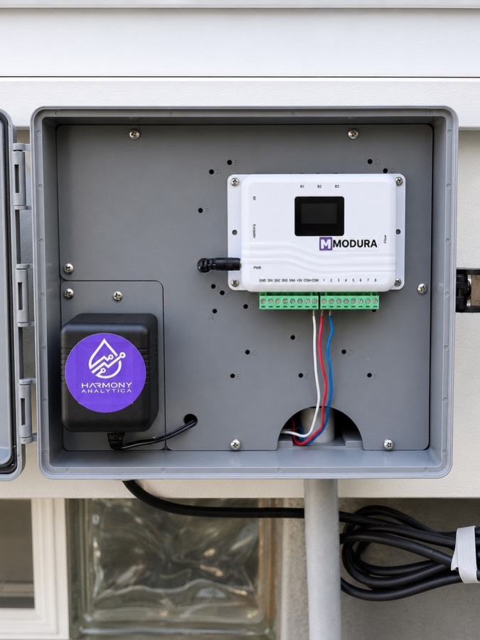 MODURA OpenSprinkler controller panel installed inside an irrigation enclosure